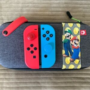 Nintendo Switch Joy-Con Controllers - Red and Blue
With extra accessories